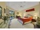 Main bedroom with ceiling fan, sliding glass door, and carpeted floors at 5509 Grove Mnr, Lady Lake, FL 32159