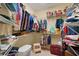 Spacious walk-in closet with organized shelves, drawers, and storage at 5509 Grove Mnr, Lady Lake, FL 32159