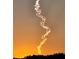 Stunning sunset view with contrail in the sky at 5717 Illumination Ln, Leesburg, FL 34748