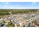 Home's location in a residential neighborhood at 893 Parrish Pl, The Villages, FL 32163