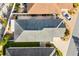 Property's aerial view showing house and driveway at 893 Parrish Pl, The Villages, FL 32163