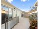 Private backyard with patio and sliding glass doors at 893 Parrish Pl, The Villages, FL 32163