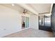 Bright sunroom with sliding glass doors leading outside at 893 Parrish Pl, The Villages, FL 32163