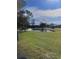 Peaceful pond view visible through the screen at 926 Willow Dr, Leesburg, FL 34748