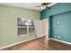 Bedroom with wood-look flooring and ceiling fan at 980 Vassar Dr, Eustis, FL 32726