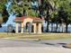 Lakeside gazebo with picnic tables and lake view at 100 W Myrtle St, Howey In The Hills, FL 34737