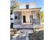 Charming two-story home with a screened porch at 100 W Myrtle St, Howey In The Hills, FL 34737