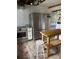 Modern kitchen with stainless steel appliances and farmhouse sink at 100 W Myrtle St, Howey In The Hills, FL 34737