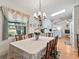 Dining room with table, chairs, and view of kitchen at 1310 Moray Ct, Leesburg, FL 34788