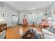 Bright living room with hardwood floors and comfortable seating at 1310 Moray Ct, Leesburg, FL 34788