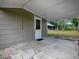 Covered back patio, great for outdoor enjoyment at 1323 Liberty Ave, Mount Dora, FL 32757