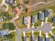 Aerial view of a property in a residential neighborhood at 16304 Spring View Ct, Clermont, FL 34711