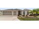 Inviting single-story home with a two-car garage and landscaped front yard at 3766 Causey Ct, The Villages, FL 32163