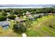 An aerial view of the property showcasing its waterfront location at 39539 Harbor Hills Blvd, Lady Lake, FL 32159