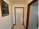 Welcoming foyer with tiled floors and a front door featuring a diamond-shaped window at 4060 Lake Marianna Dr, Winter Haven, FL 33881