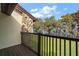 Private balcony overlooking serene lake views and lush landscape at 5415 Banana Point Dr, Okahumpka, FL 34762