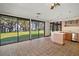 Kitchen with lake views and a large island at 5415 Banana Point Dr, Okahumpka, FL 34762