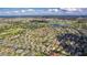 Large community with various houses and golf course visible at 747 Bradford Loop, The Villages, FL 32163