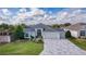 Single-Gathering home with two-car garage and landscaped yard at 747 Bradford Loop, The Villages, FL 32163