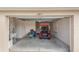 Spacious garage with golf cart and additional storage space at 867 Parrish Pl, The Villages, FL 32163