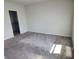 Cozy bedroom with neutral walls and plush carpeting at 964 Rivers Crossing St, Clermont, FL 34714