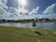 Community lake view homes with a stunning waterfront view at 964 Rivers Crossing St, Clermont, FL 34714