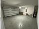 Spacious garage with high ceilings and ample storage space at 964 Rivers Crossing St, Clermont, FL 34714
