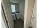 Compact laundry room with washer and dryer at 964 Rivers Crossing St, Clermont, FL 34714