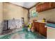 Unfinished laundry area with space for appliances at 11451 Pala Verda Ave, Leesburg, FL 34788