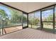 Spacious screened porch with composite decking and backyard views at 11451 Pala Verda Ave, Leesburg, FL 34788