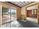 Sunroom with sliding glass door and access to outdoors at 11451 Pala Verda Ave, Leesburg, FL 34788