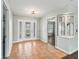 Foyer with tiled flooring and a stained glass door at 11584 Se 175Th St, Summerfield, FL 34491