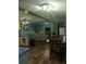 Open concept living area combining kitchen, dining, and living room spaces at 12141 Lake Pines Rd, Leesburg, FL 34788