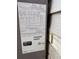Close-up of the air conditioning unit's specifications at 1335 E Schwartz Blvd, Lady Lake, FL 32159