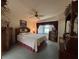 Bedroom with double bed, window, and dresser at 1335 E Schwartz Blvd, Lady Lake, FL 32159