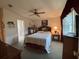 Comfortable guest bedroom with a queen-size bed and en-suite bathroom at 1335 E Schwartz Blvd, Lady Lake, FL 32159
