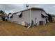 Side view of mobile home showing additional details at 1335 E Schwartz Blvd, Lady Lake, FL 32159