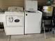 Laundry room with washer, dryer, and folding chair at 1335 E Schwartz Blvd, Lady Lake, FL 32159