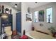 Bathroom with soaking tub, toilet, and decorative shower curtain at 1715 Lilly Ln, Lady Lake, FL 32159