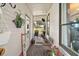 Cozy breezeway with outdoor seating and decorative accents at 1715 Lilly Ln, Lady Lake, FL 32159