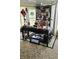 Home office features a large desk, comfortable chair, and built-in shelving at 1715 Lilly Ln, Lady Lake, FL 32159