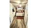 Spacious main bedroom with a king-size bed and plenty of closet space at 1715 Lilly Ln, Lady Lake, FL 32159