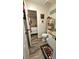 Convenient powder room, offering a toilet and sink, near a bedroom at 1715 Lilly Ln, Lady Lake, FL 32159