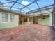 Screened porch with brick pavers and access to the living areas at 3556 Creek Run Ln, Eustis, FL 32736