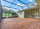 Covered patio with brick flooring and access to the backyard at 3556 Creek Run Ln, Eustis, FL 32736