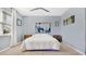 Spacious bedroom with a queen bed and neutral decor at 356 Irving Bend Dr, Groveland, FL 34736