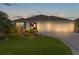 Beautiful home with three-car garage and landscaping at 4318 St Stephen St, The Villages, FL 32163
