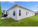 Well-maintained exterior showcasing clean lines and a manicured lawn at 4318 St Stephen St, The Villages, FL 32163