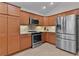 Well-equipped kitchen featuring stainless steel appliances and ample cabinetry at 4318 St Stephen St, The Villages, FL 32163