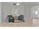 Sitting area with two armchairs and a side table at 4318 St Stephen St, The Villages, FL 32163